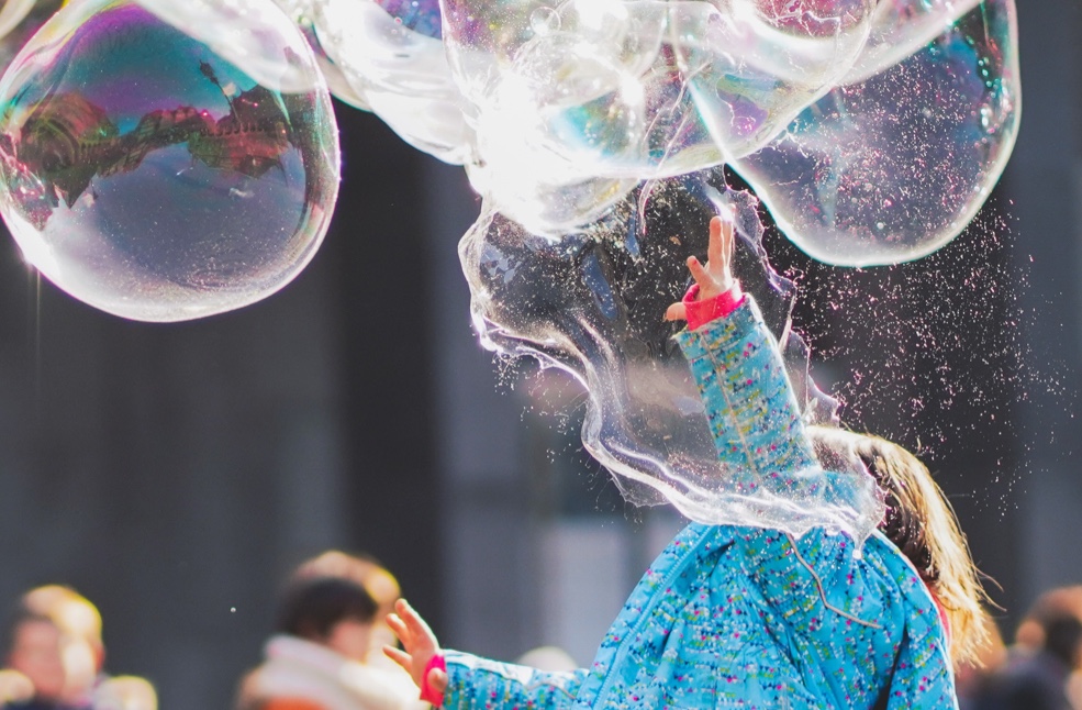 Kid playing with Bubbles